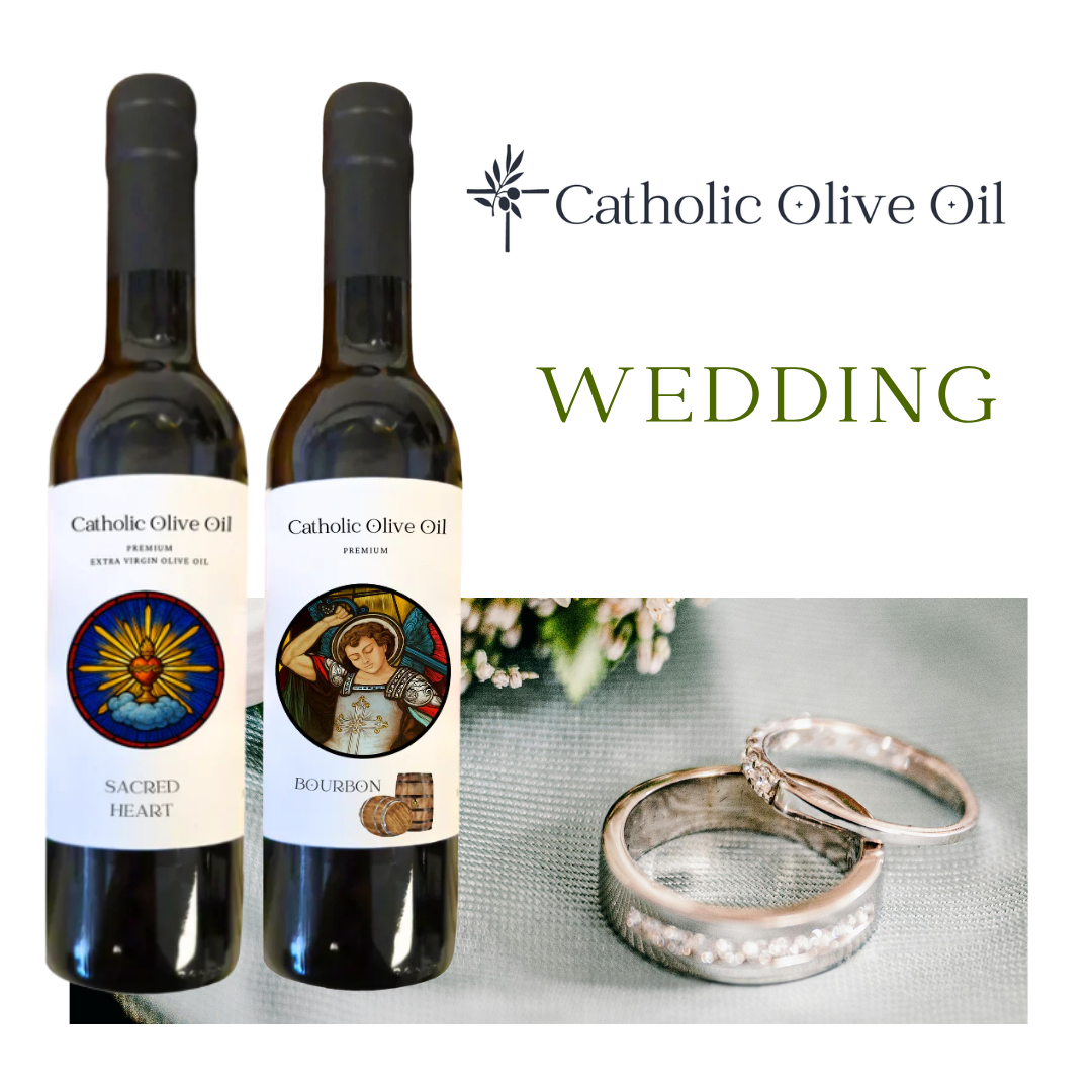 Two bottles of Catholic Olive Oil with wedding rings on a white background